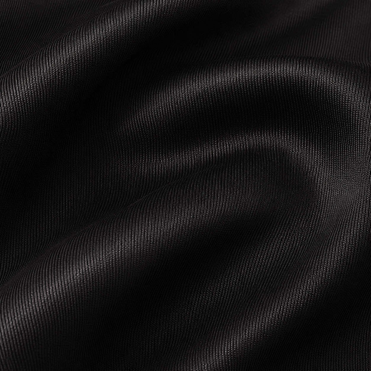Close-up of black satin fabric from the Estrella Swim Jasmine bikini set.