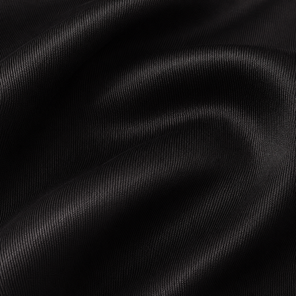 Close-up of black satin fabric from the Estrella Swim Jasmine bikini set.