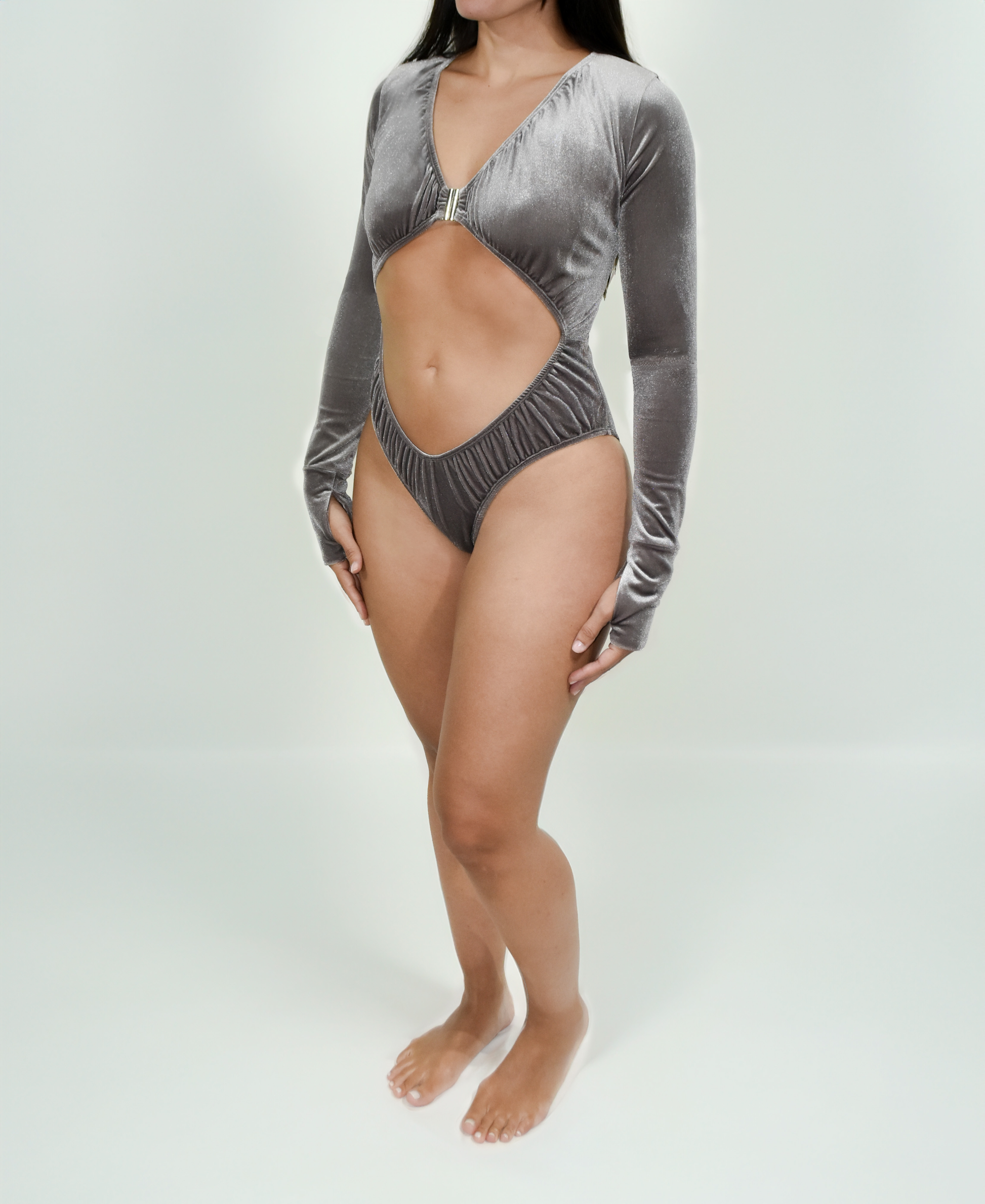Model wearing the Estrella Swim Selena one-piece swimsuit in grey velvet, front view on white background.