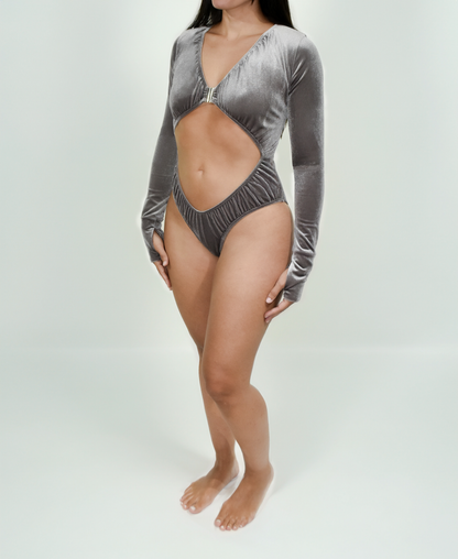 Model wearing the Estrella Swim Selena one-piece swimsuit in grey velvet, front view on white background.
